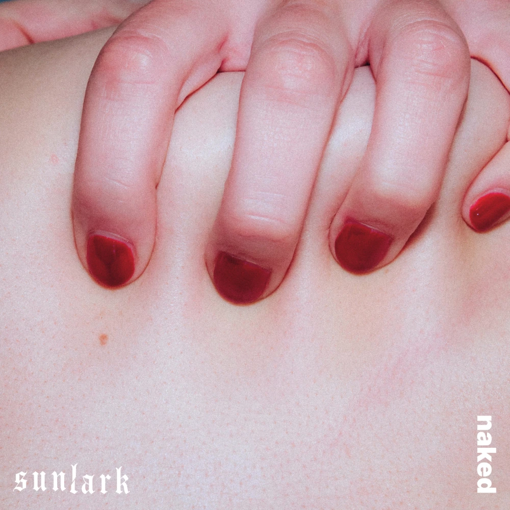 cover art for single naked showing a woman with red nails grabbing onto skin.